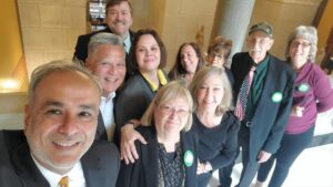 Legislators and supporters of HJ34 celebrate the resolution's adoption on May 25, 2023 at the Connecticut State Capitol.